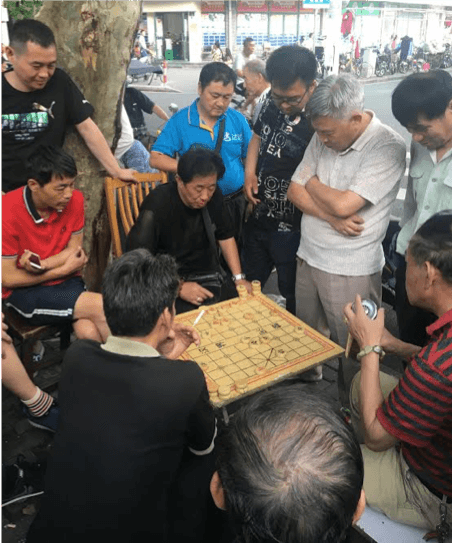 a Chinese Chess match on a street corner in South Huangpu