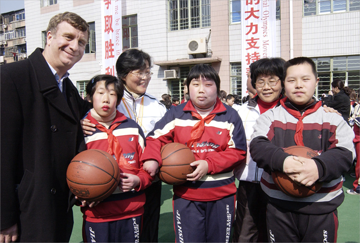 William Alford with students from a special education school in China